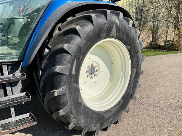 2001 New Holland TS100 Four-Wheel Drive Farm Tractor 2001 New Holland TS100 Four-Wheel Drive Farm Tractor