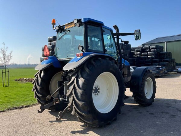 2001 New Holland TS100 Four-Wheel Drive Farm Tractor 2001 New Holland TS100 Four-Wheel Drive Farm Tractor