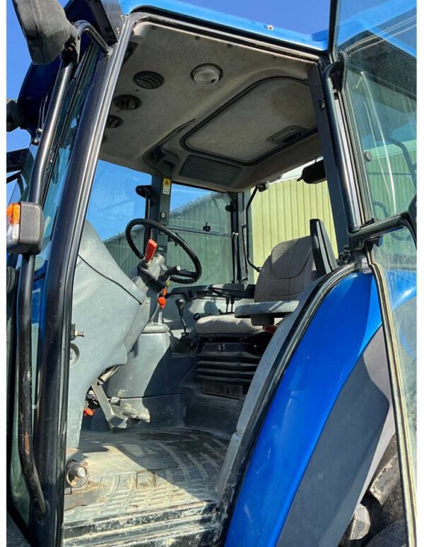 2001 New Holland TS100 Four-Wheel Drive Farm Tractor 2001 New Holland TS100 Four-Wheel Drive Farm Tractor