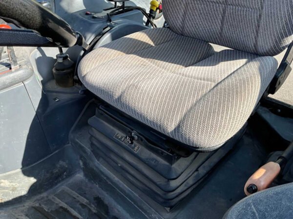 2001 New Holland TS100 Four-Wheel Drive Farm Tractor 2001 New Holland TS100 Four-Wheel Drive Farm Tractor