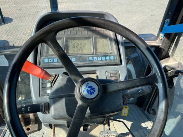 2001 New Holland TS100 Four-Wheel Drive Farm Tractor 2001 New Holland TS100 Four-Wheel Drive Farm Tractor