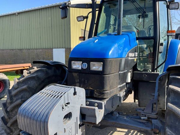 2001 New Holland TS100 Four-Wheel Drive Farm Tractor 2001 New Holland TS100 Four-Wheel Drive Farm Tractor