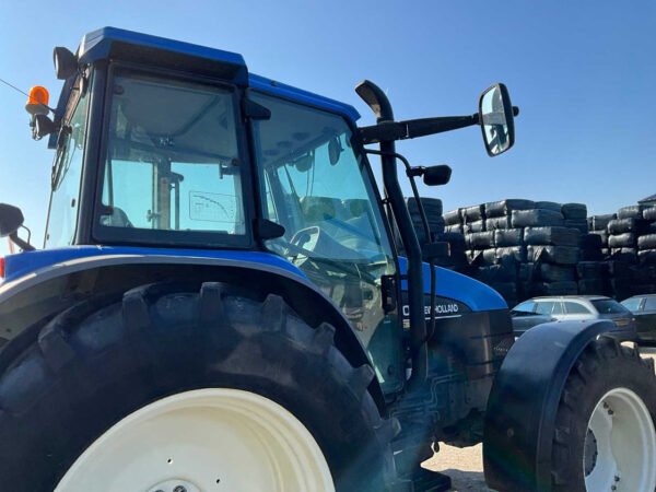 2001 New Holland TS100 Four-Wheel Drive Farm Tractor 2001 New Holland TS100 Four-Wheel Drive Farm Tractor