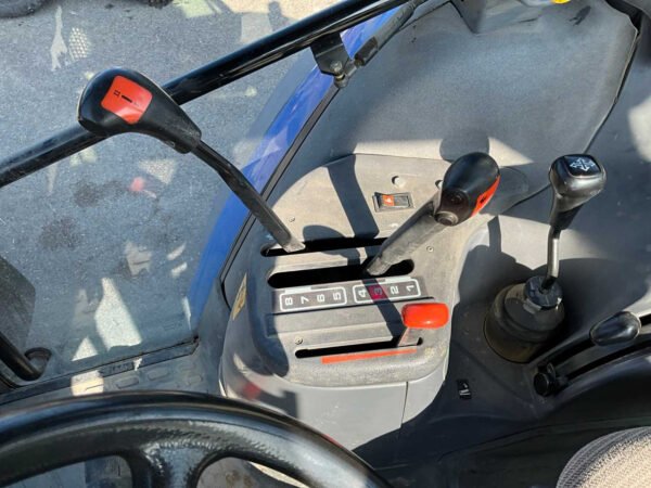 2001 New Holland TS100 Four-Wheel Drive Farm Tractor 2001 New Holland TS100 Four-Wheel Drive Farm Tractor