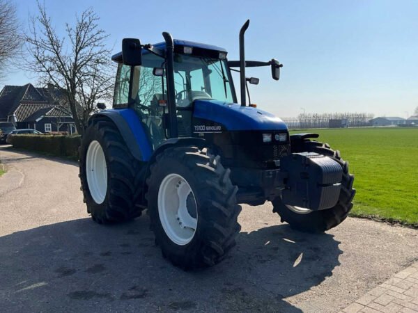 2001 New Holland TS100 Four-Wheel Drive Farm Tractor 2001 New Holland TS100 Four-Wheel Drive Farm Tractor