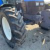 2001 New Holland TS100 Four-Wheel Drive Farm Tractor 2001 New Holland TS100 Four-Wheel Drive Farm Tractor