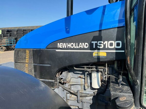2001 New Holland TS100 Four-Wheel Drive Farm Tractor 2001 New Holland TS100 Four-Wheel Drive Farm Tractor