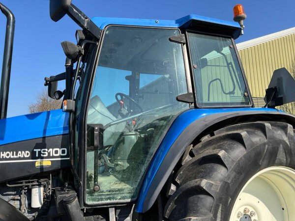 2001 New Holland TS100 Four-Wheel Drive Farm Tractor 2001 New Holland TS100 Four-Wheel Drive Farm Tractor