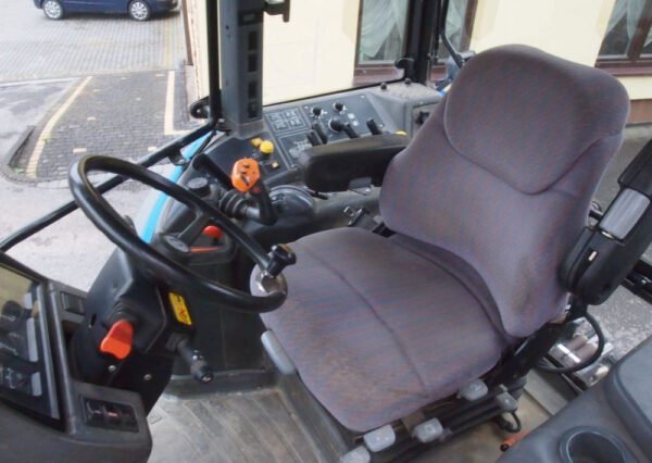 New Holland TM 140 Tractor 2004 – Powerful Agricultural Farm Tractor