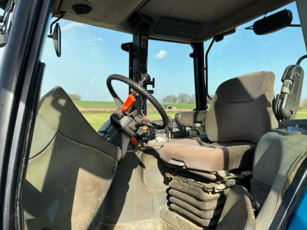 New Holland TM135 Suspended Front Axle All-Wheel-Drive Farm Tractor 2003