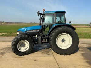 New Holland TM135 Suspended Front Axle All-Wheel-Drive Farm Tractor 2003 New Holland TM135 Suspended Front Axle All-Wheel-Drive Farm Tractor 2003