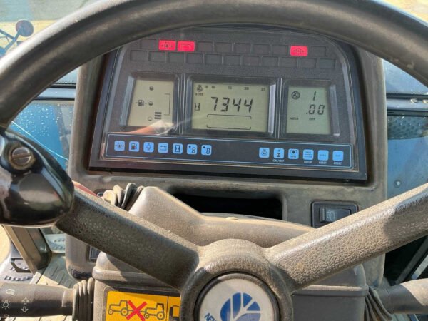 New Holland TM135 Suspended Front Axle All-Wheel-Drive Farm Tractor 2003