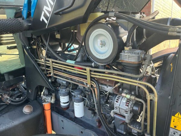 New Holland TM135 Suspended Front Axle All-Wheel-Drive Farm Tractor 2003