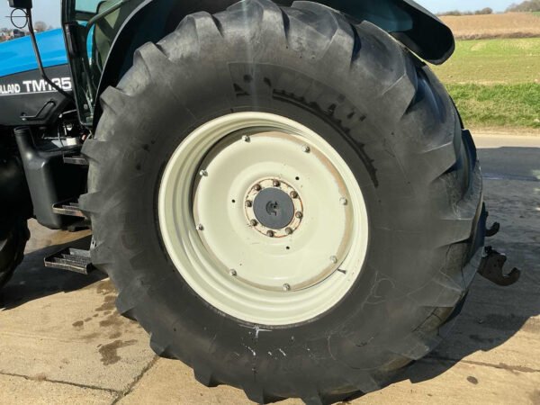 New Holland TM135 Suspended Front Axle All-Wheel-Drive Farm Tractor 2003