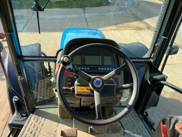 New Holland TM135 Suspended Front Axle All-Wheel-Drive Farm Tractor 2003